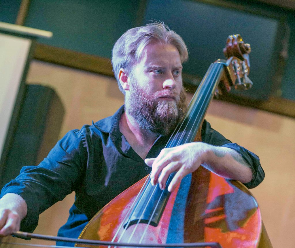Elsen Price playing a double bass